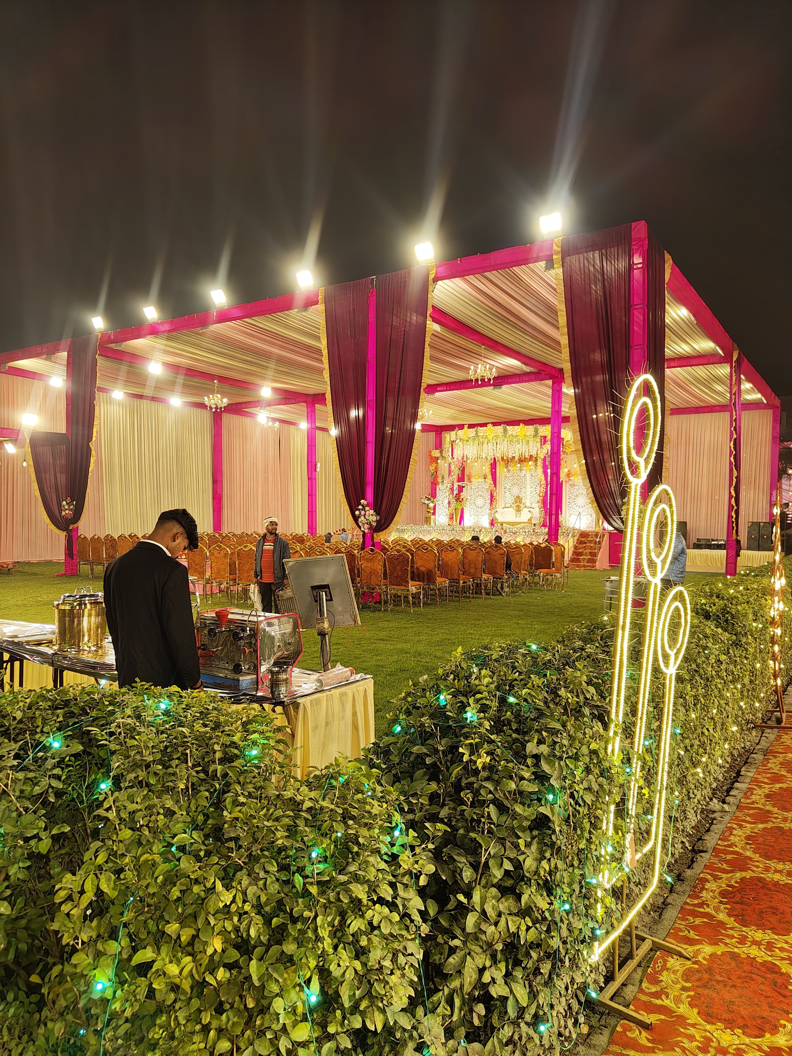 Outdoor wedding mandap with elegant drapes